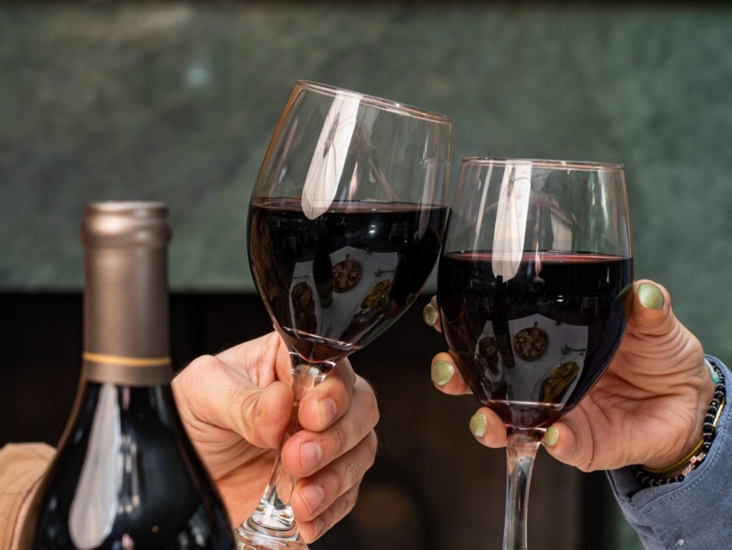 Guests enjoying BYOB wine at Capisce Trattoria in Morris Plains